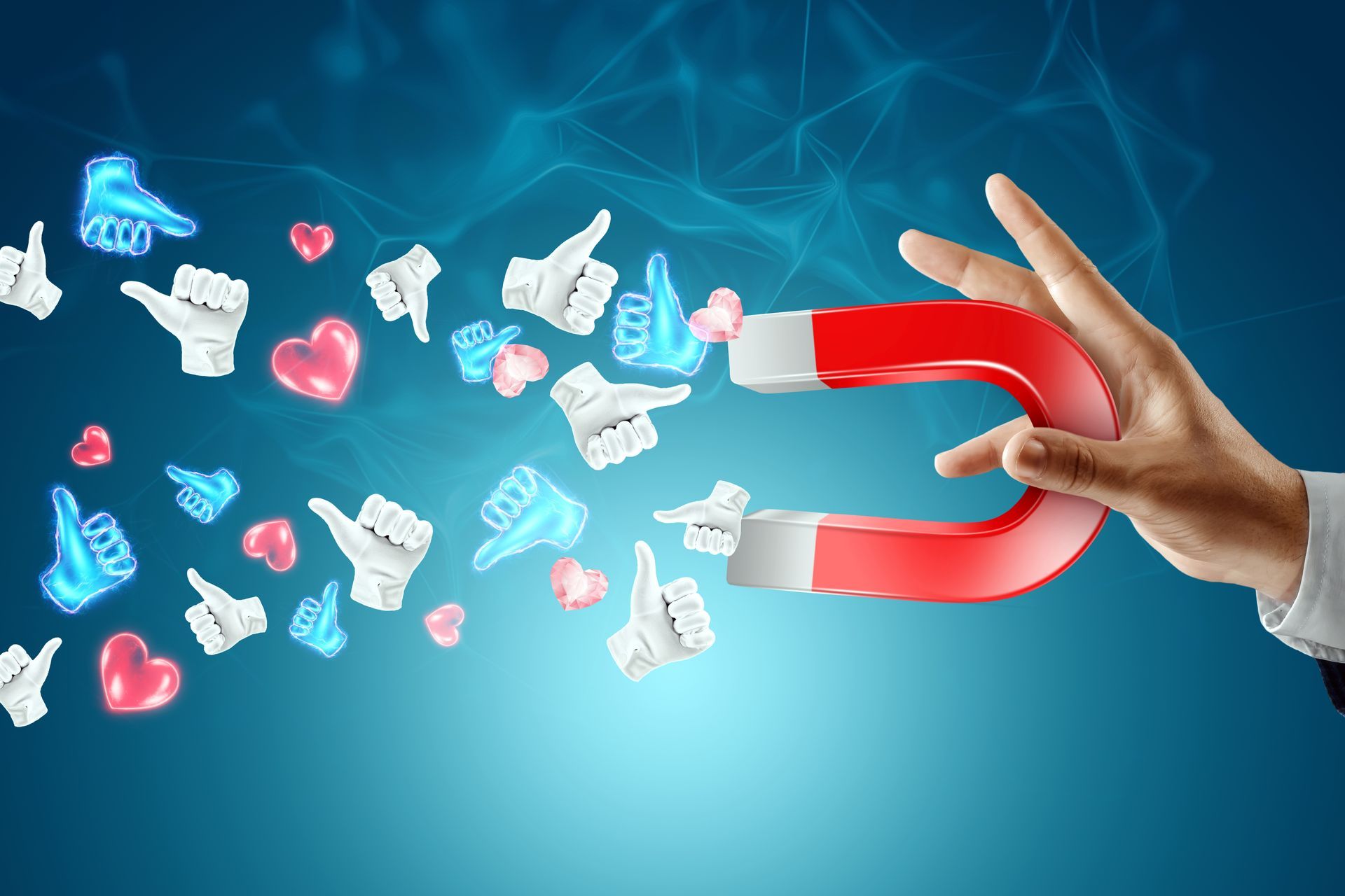 A hand is holding a large magnet with thumbs up and hearts coming out of it.