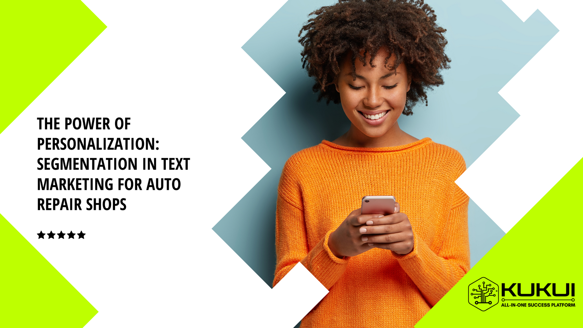 A woman in an orange sweater is looking at her phone.