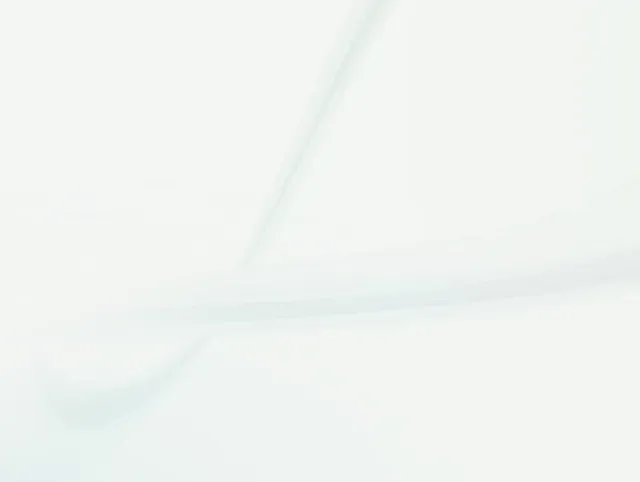 Abstract pale green and white background with soft diagonal streaks
