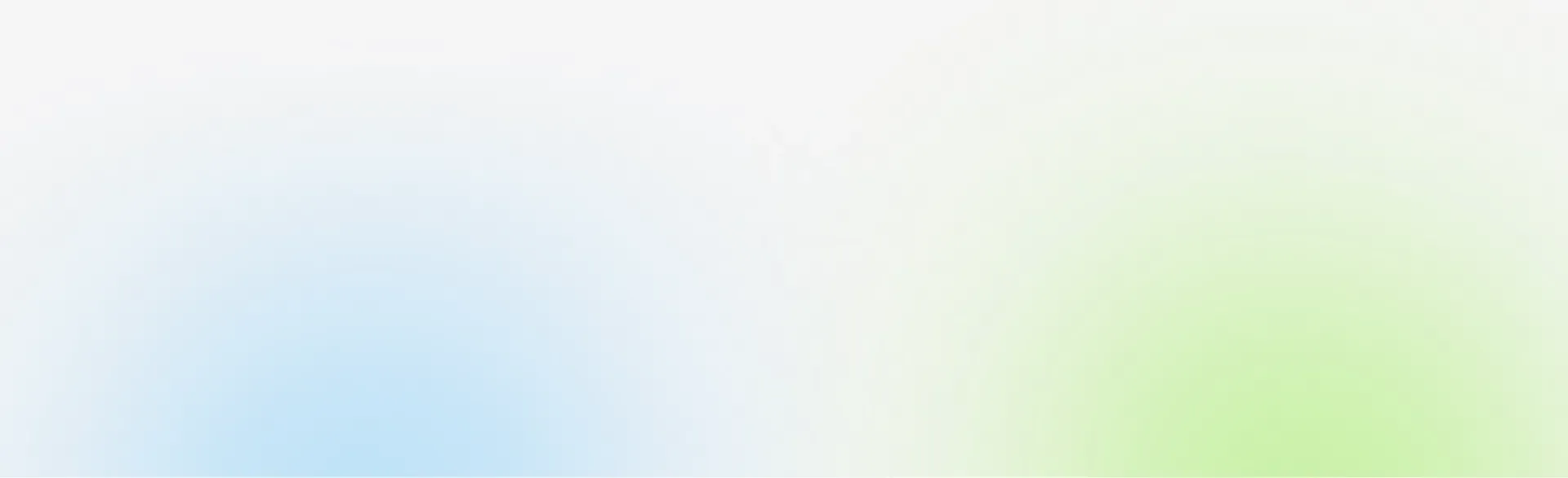 Soft pastel gradient background fading from white to light blue and pale green, with a blurred horizon line