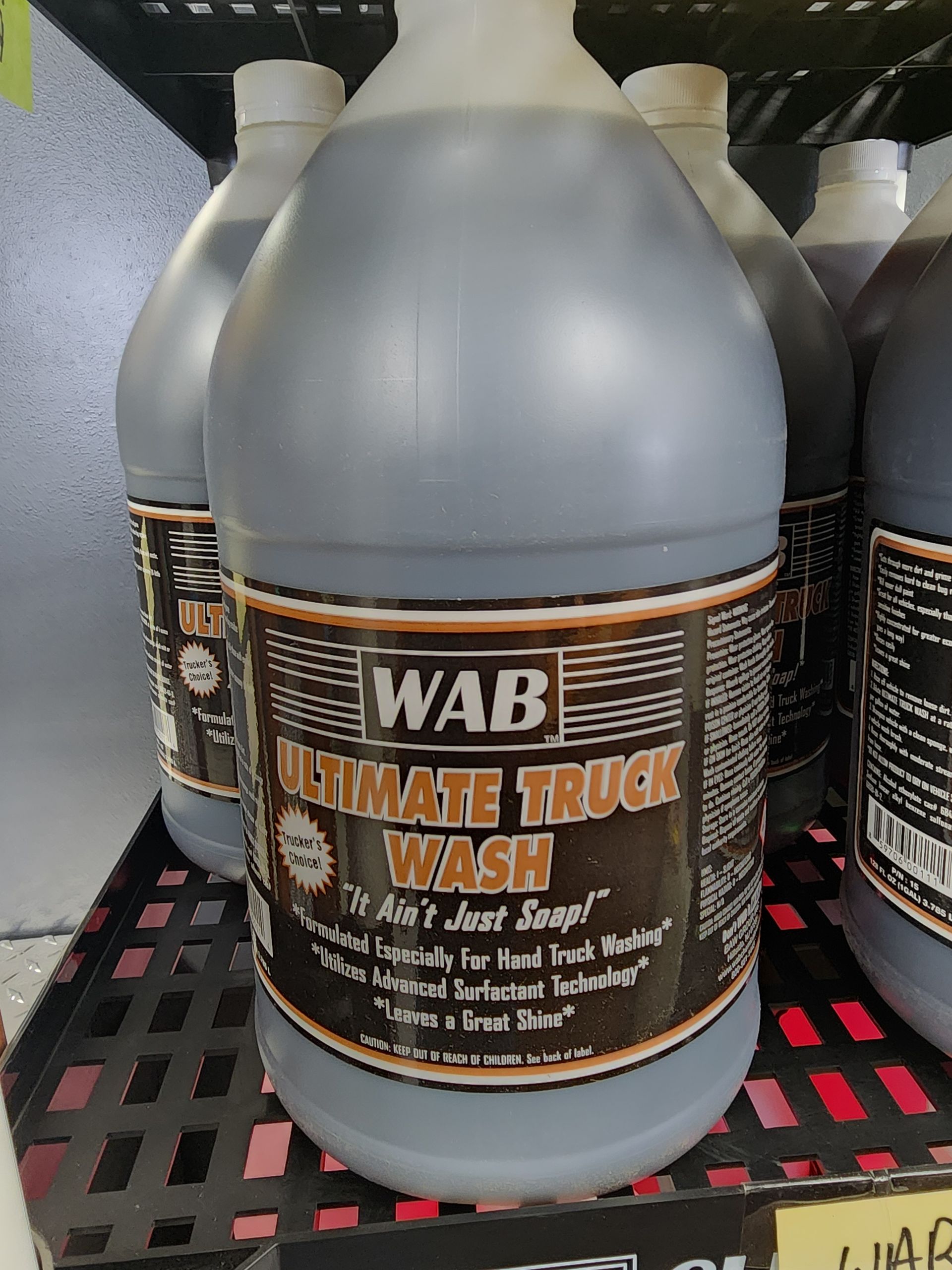 A bottle of wab ultimate truck wash is sitting on a shelf