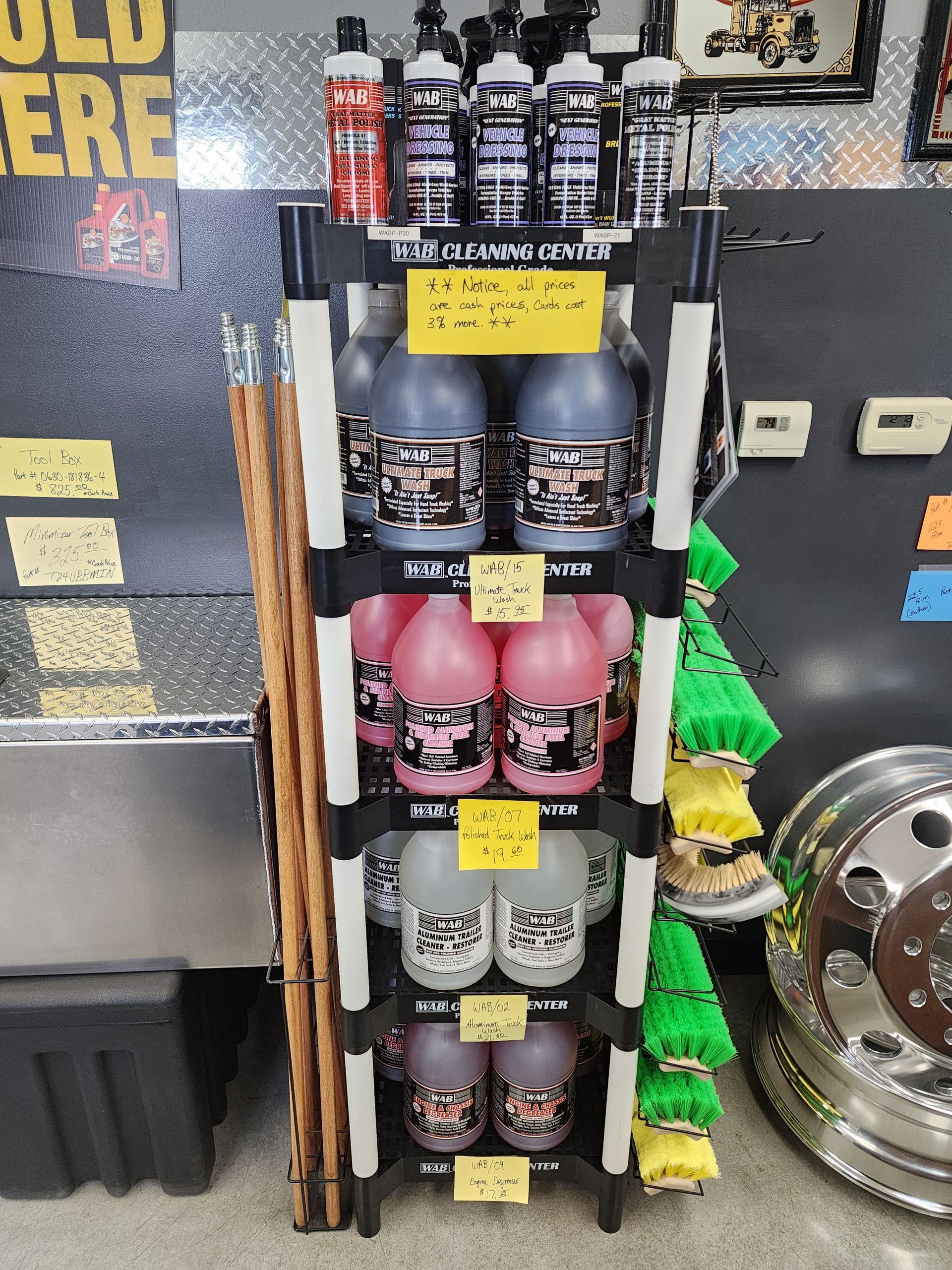 A shelf with bottles of cleaning products on it