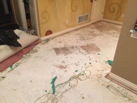 Exposed Concrete subfloor missing carpet pad before Carpets by Chris Stretching & Repair installed new pad perfectly.