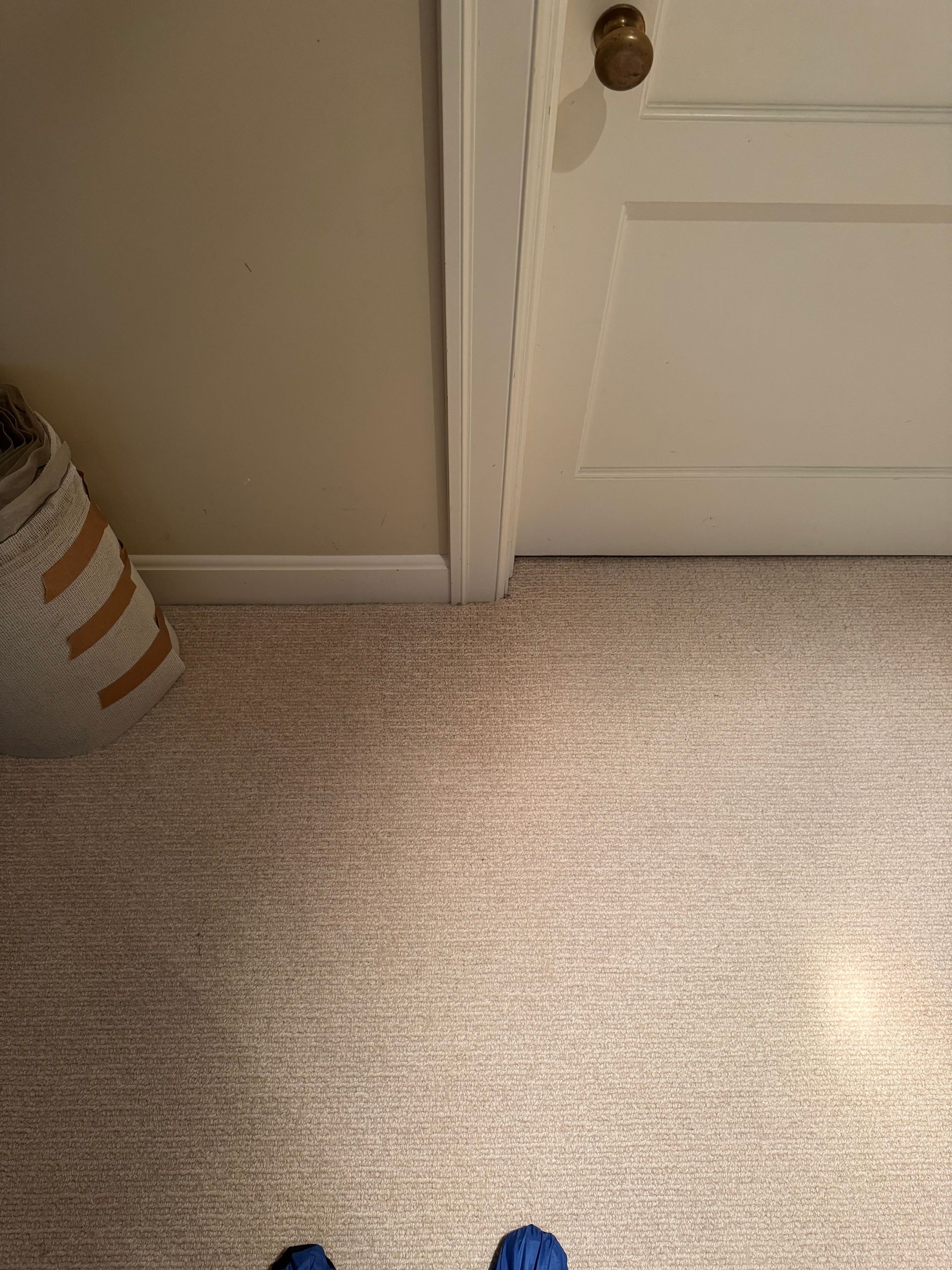 Dark Stain is gone on Wool Carpet after Carpets by Chris Stretching & Repair repaired it perfectly.