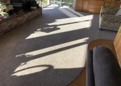Living room carpet after Carpets by Chris Stretching & Repair Stretched it perfectly.
