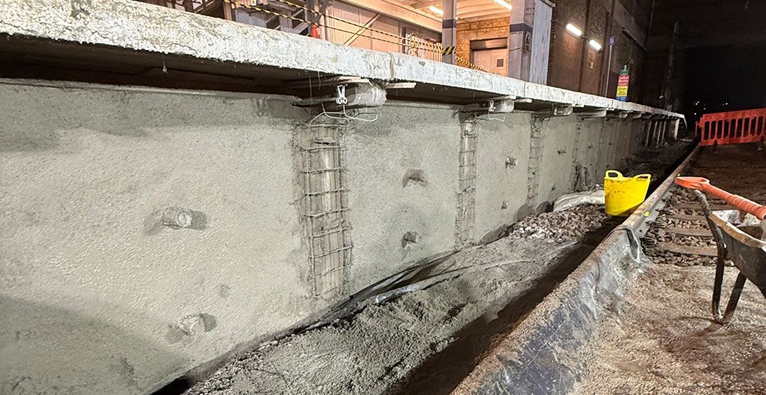 A concrete retaining wall being repaired during overnight works at Leigh-on-Sea Railway station.