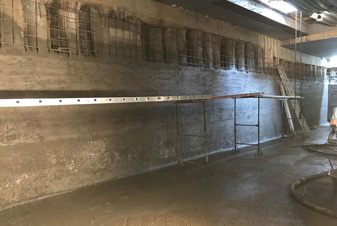 An example of pile facing with freshly applied spray concrete in a basement area.