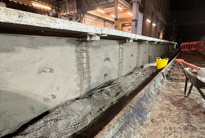 A concrete retaining wall being repaired during  overnight works at Leigh-on-Sea Railway station.