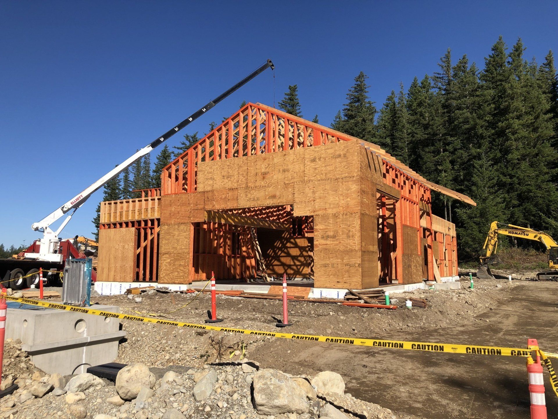 A building is being built with a crane in the background.