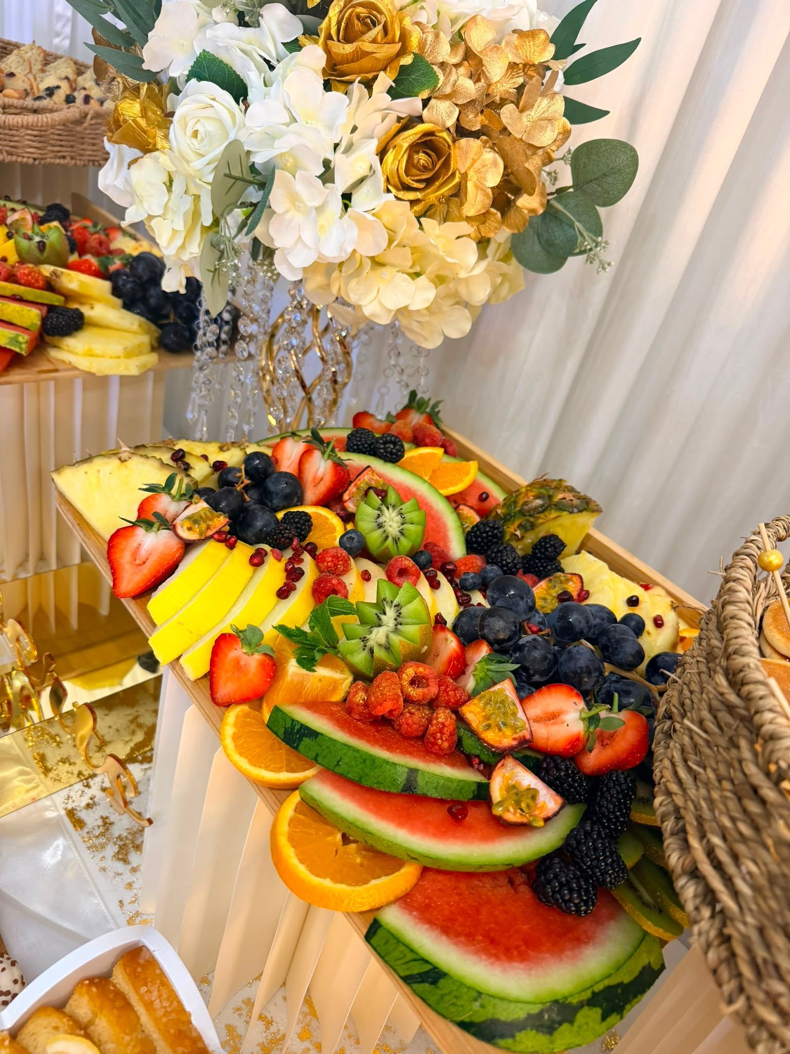 Dessert cups and sweet treats grazing table setup