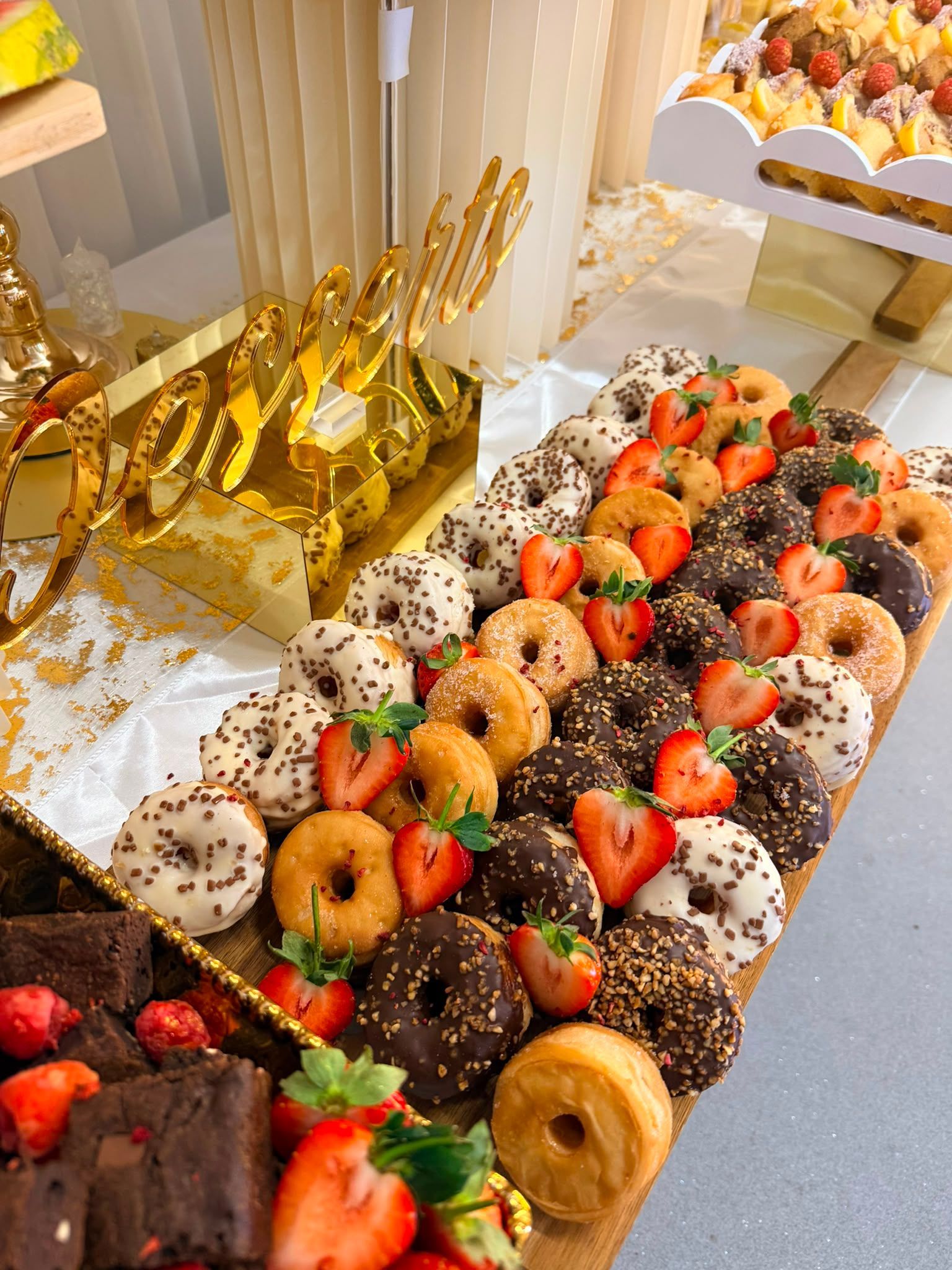 Close up of dessert cups on a grazing table