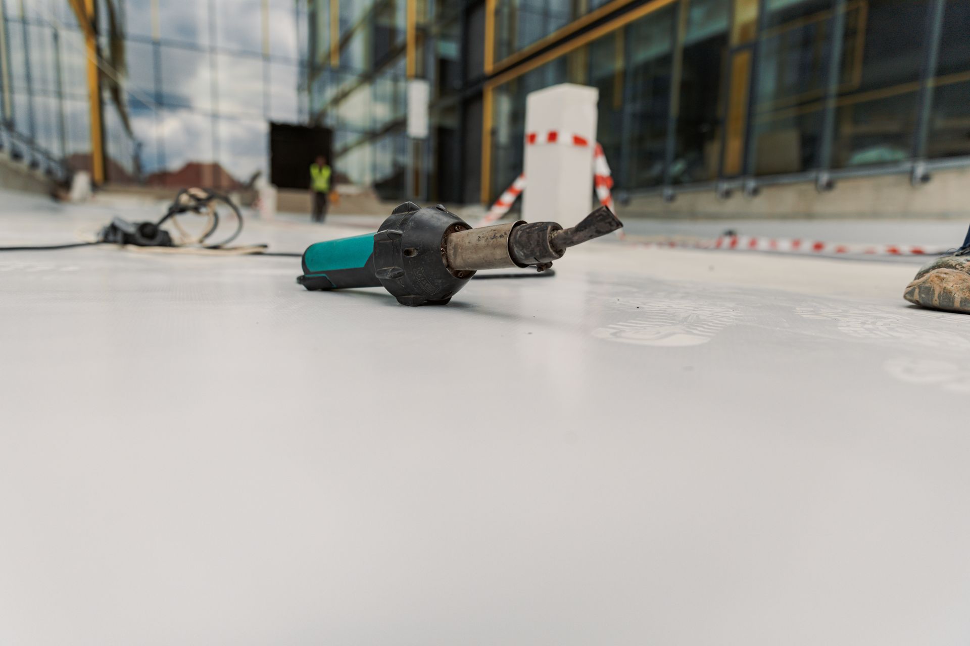 TPO membrane during a commercial roof installation TPO membrane during a commercial roof installation