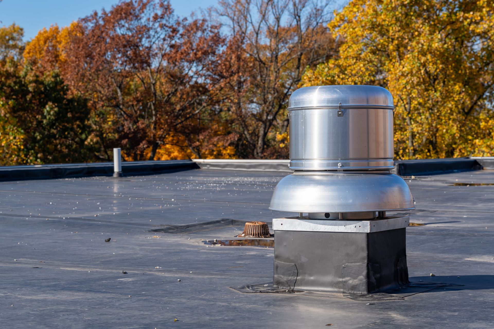 Photo of Business Roof Repair showing new EPDM on large commercial building