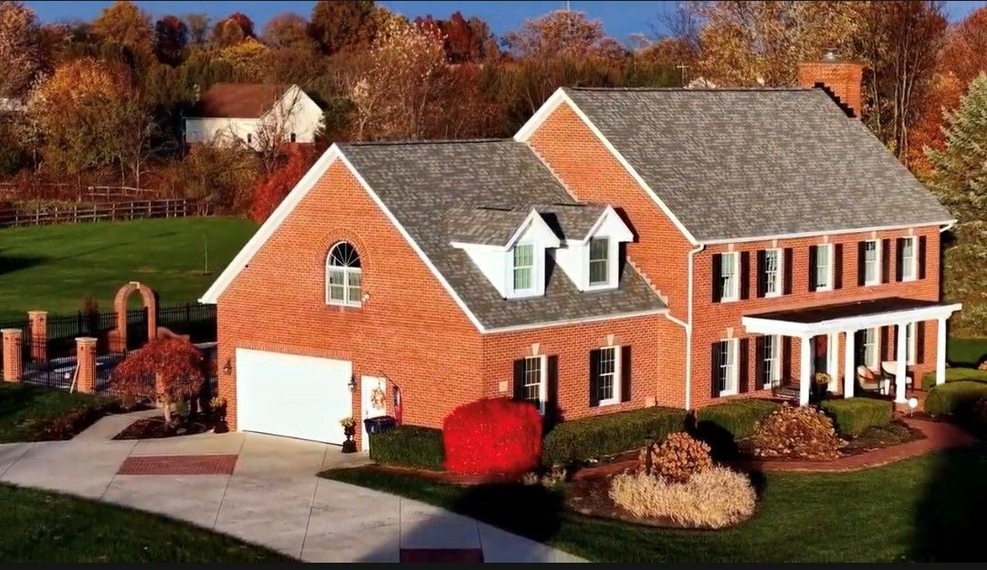 Roofing — Two-Storey House With Shingles in Columbus, OH Roofing — Two-Storey House With Shingles in Columbus, OH