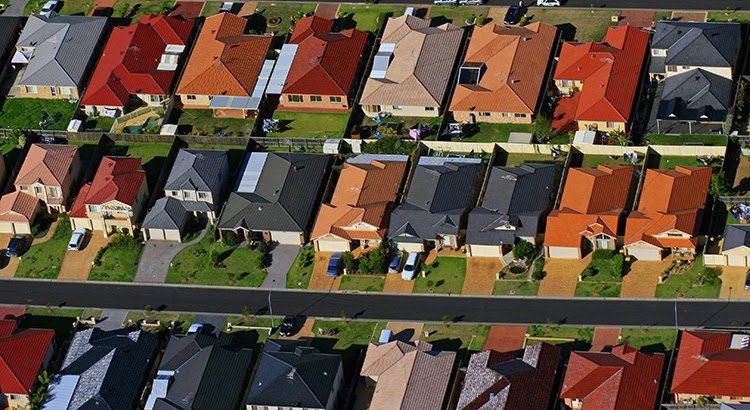 An aerial view of a residential area with lots of houses