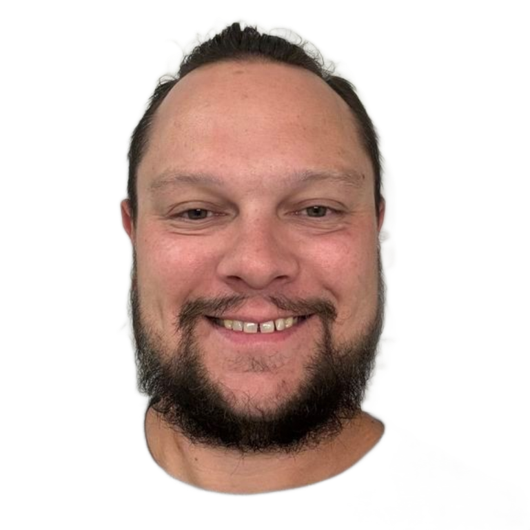 Smiling bearded man with short dark hair on a white background