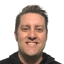 Smiling man with short dark hair wearing a black hoodie against a white background