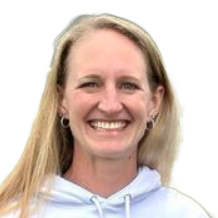 Smiling person in a white hoodie against a plain white background
