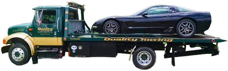 Quality Towing truck Fayetteville NC. A black car is on the back of a tow truck