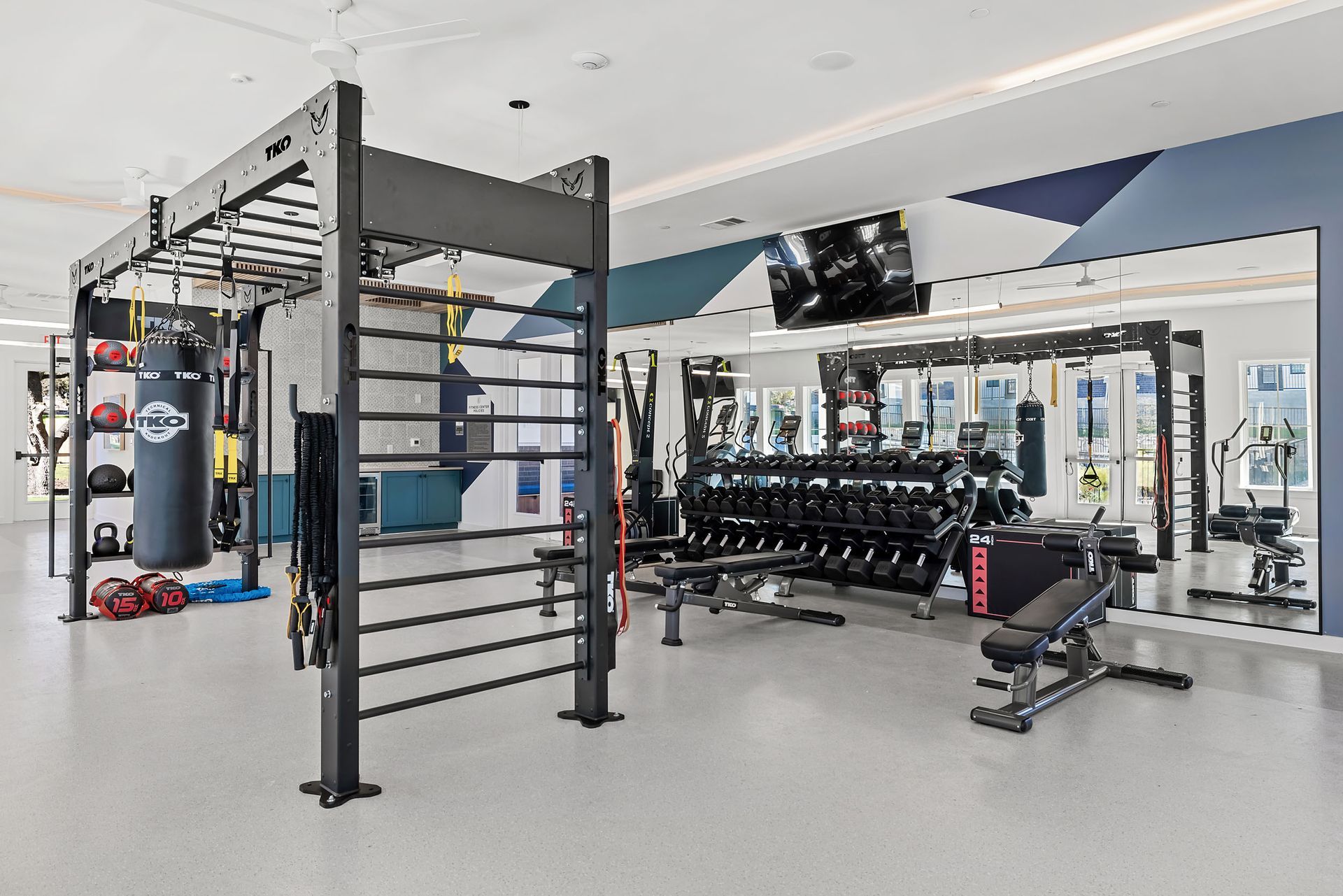 A large fitness center filled with lots of exercise equipment at The Everett. offering apartments in Northwest Austin, TX.