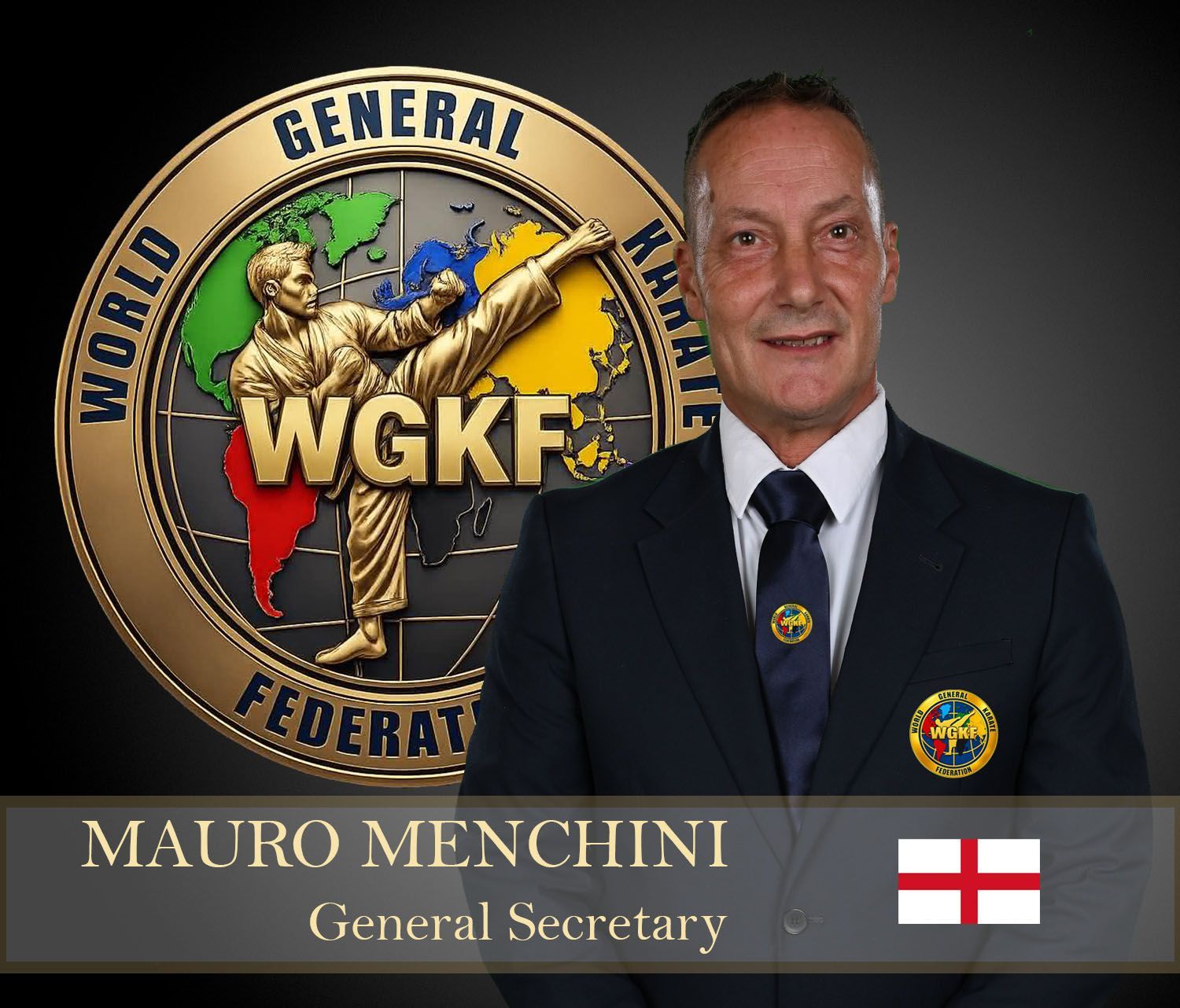 Maurizio Menchini beside WGKF World Federation emblem, wearing a dark suit and tie, with England flag icon
