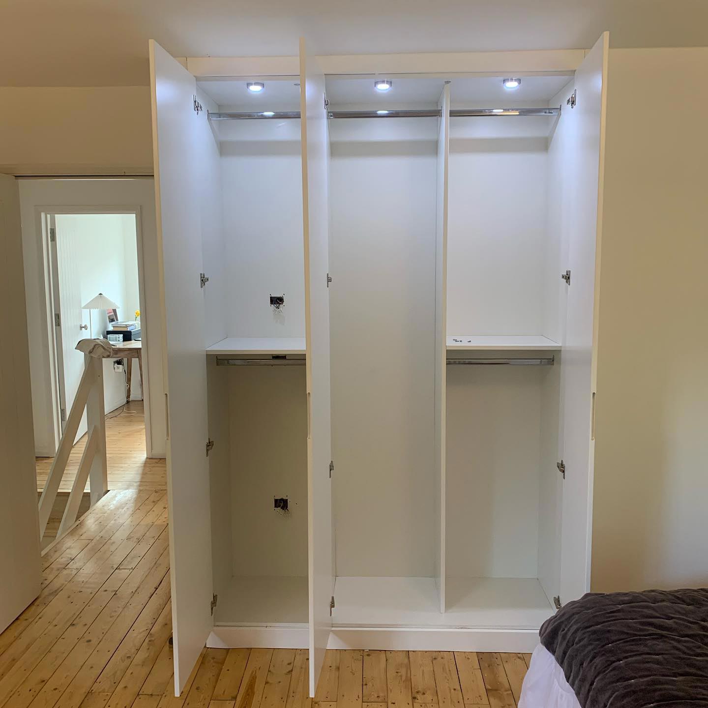 MDF fitted wardrobe with inside lighting in South London