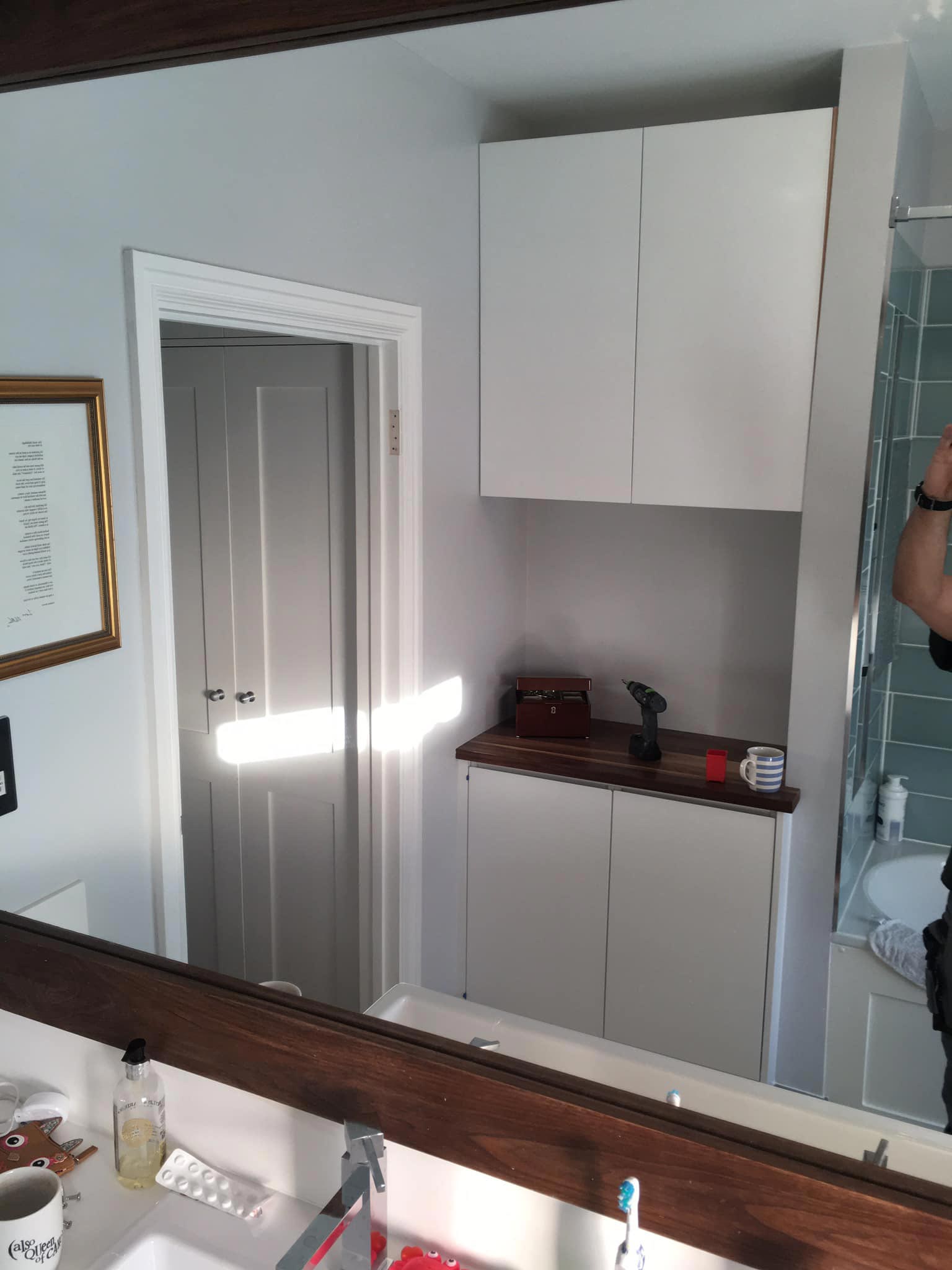White fitted bathroom cupboard in Stoke Newington