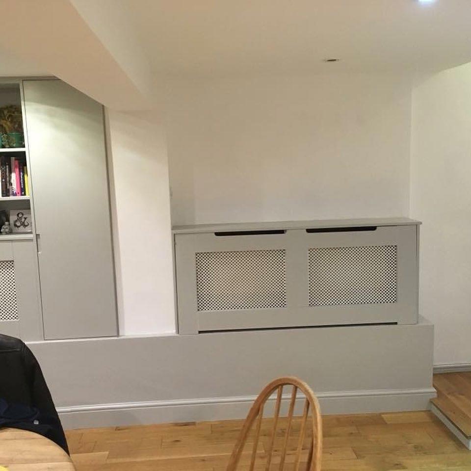 Timber grey painted radiator cover in Stoke Newington