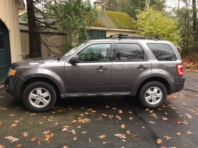 A Gray Car Parked in a Driveway — Portsmouth, NH — Lager Susan R A Gray Car Parked in a Driveway — Portsmouth, NH — Lager Susan R