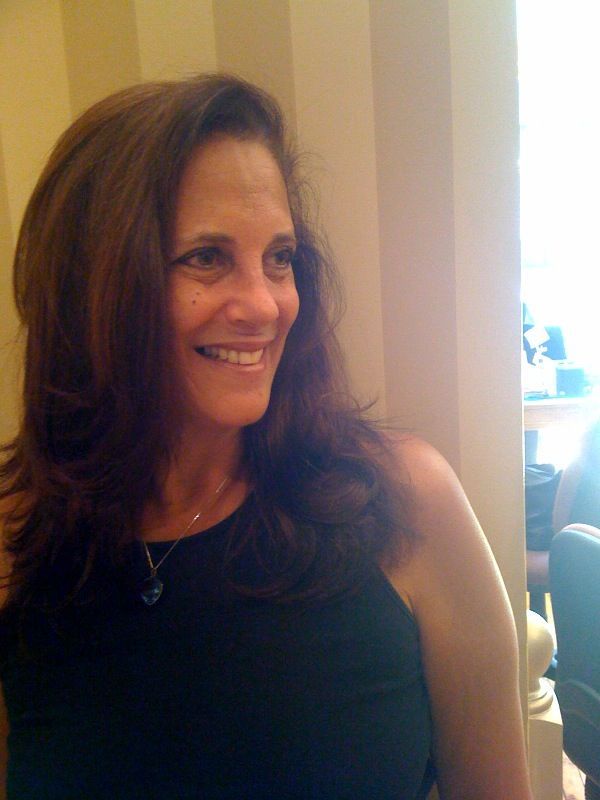 A Woman Wearing a Black Tank Top and a Necklace — Portsmouth, NH — Lager Susan R