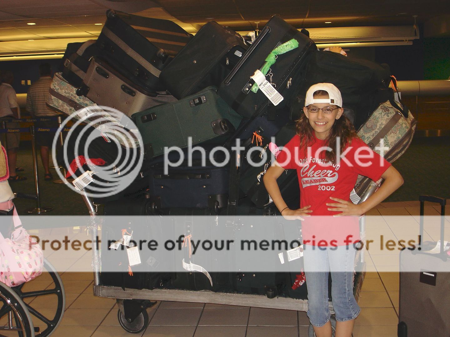 A Girl is Standing in Front of a Cart Full of Luggage — Portsmouth, NH — Lager Susan R