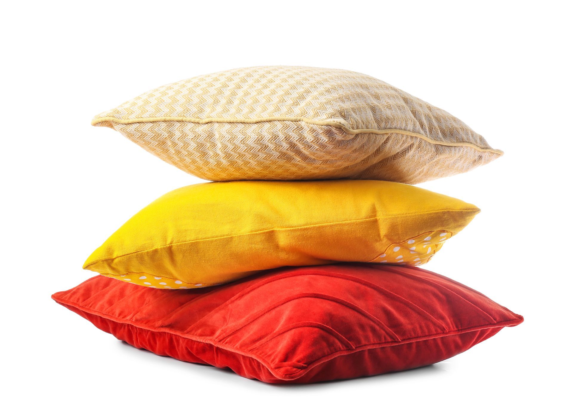 a person wearing a yellow glove is cleaning a brown leather couch