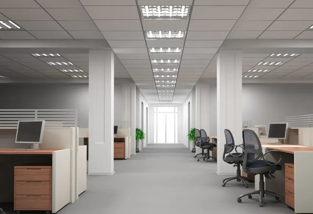 an office with multiple desks and chairs