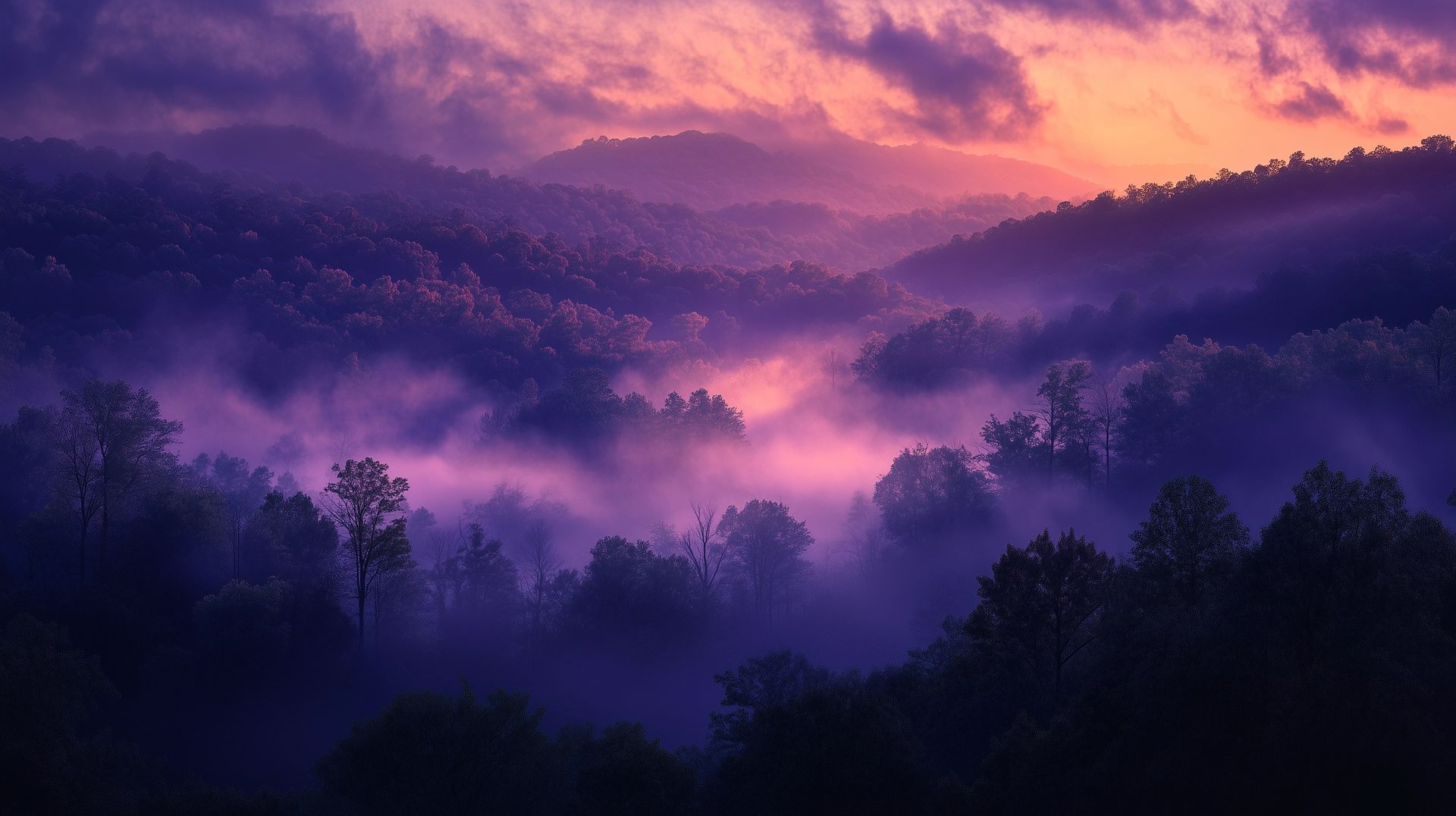 a misty purple pink mountain landscape