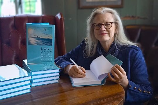 Melody signing copies of her latest book.
