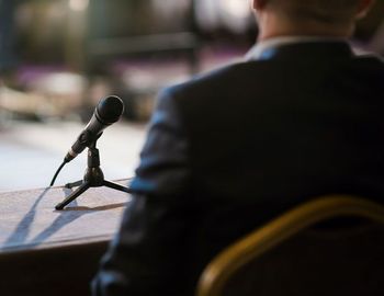 expert witness image with microphone