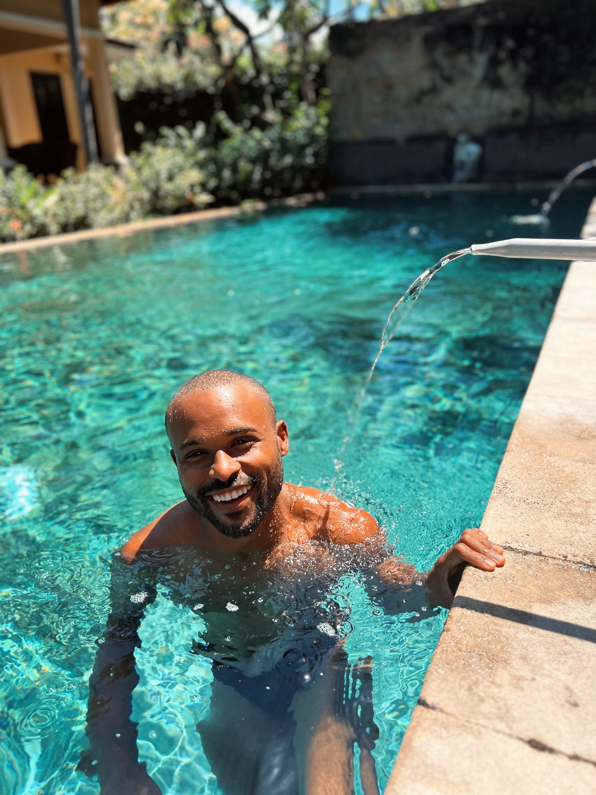 A close up of the author, Lynray Barends in a pool