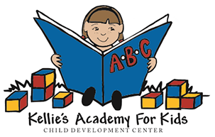 Kelnie's Academy For Kids logo with a child reading a blue ABC book beside colorful blocks
