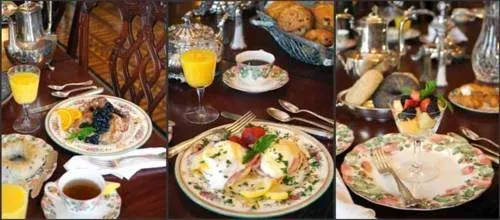 Three plated meals with drinks on a restaurant table, including pasta, salad, and coffee