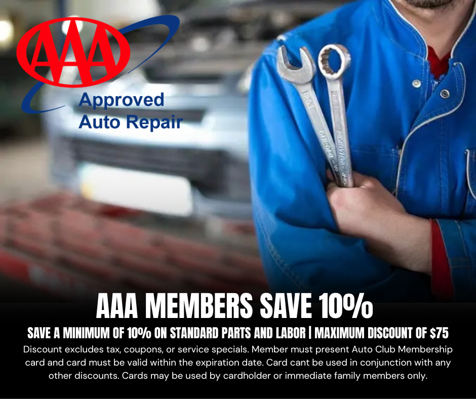 A man is holding a pair of wrenches in front of a car. | AK Auto Repair
