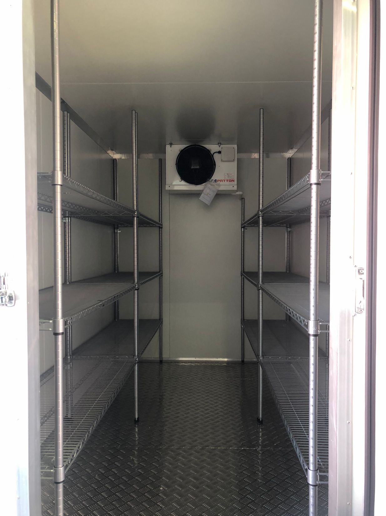 Shelving in portable coolrooms