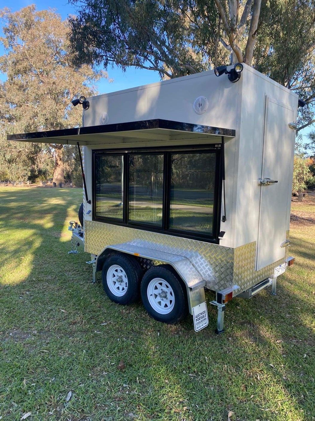 Awnings for portable coolrooms