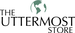 The logo for the uttermost store has a globe on it.