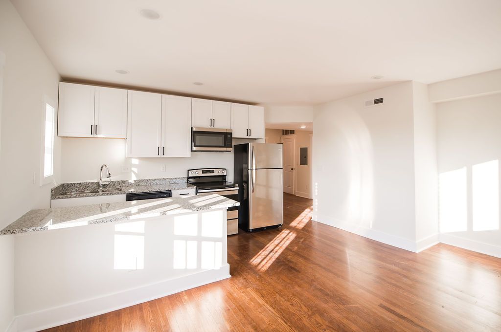 Fort Mitchell Flats - Open living room with kitchen connected