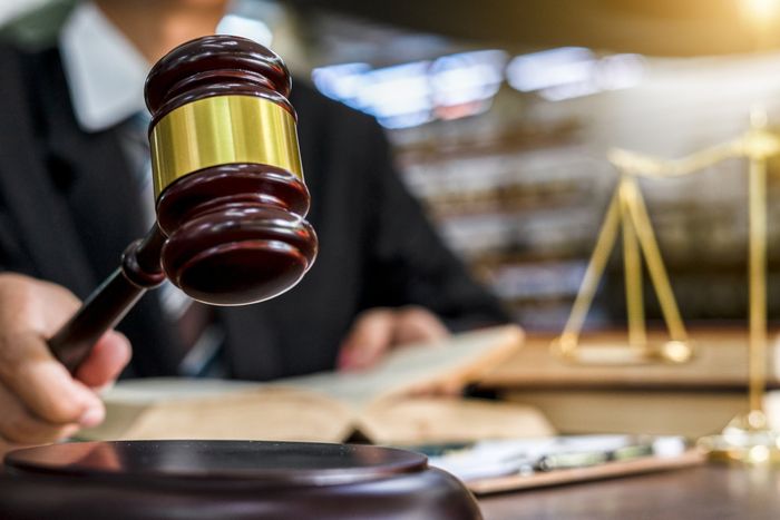 Close Up Judge Holding Gavel - Novato, CA - James Wattson Attorney At Law Close Up Judge Holding Gavel - Novato, CA - James Wattson Attorney At Law
