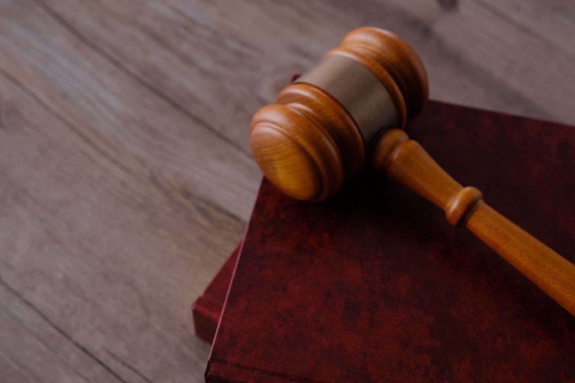 Judge Gavel With Books On Wooden Table - Novato, CA - James Wattson Attorney At Law Judge Gavel With Books On Wooden Table - Novato, CA - James Wattson Attorney At Law