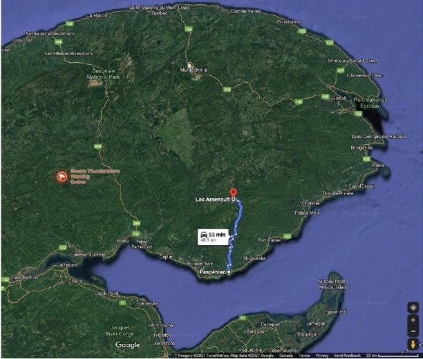 A map of a large island with a blue line going through it.