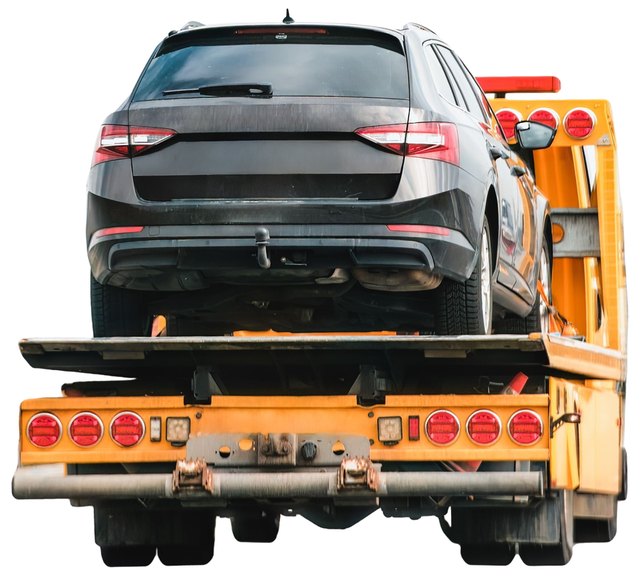 Black car loaded onto a yellow tow truck.
