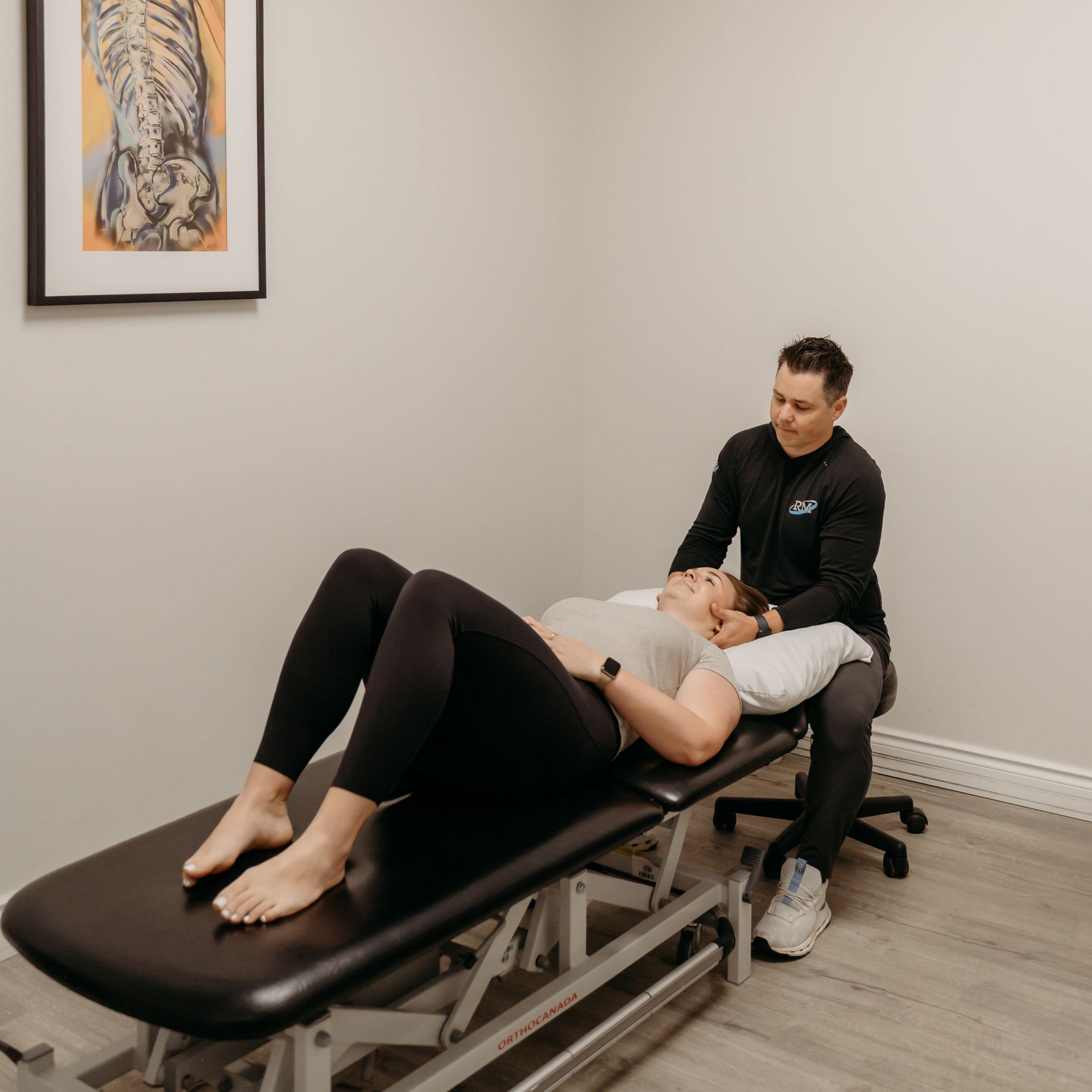 Physiotherapist performing manual therapy