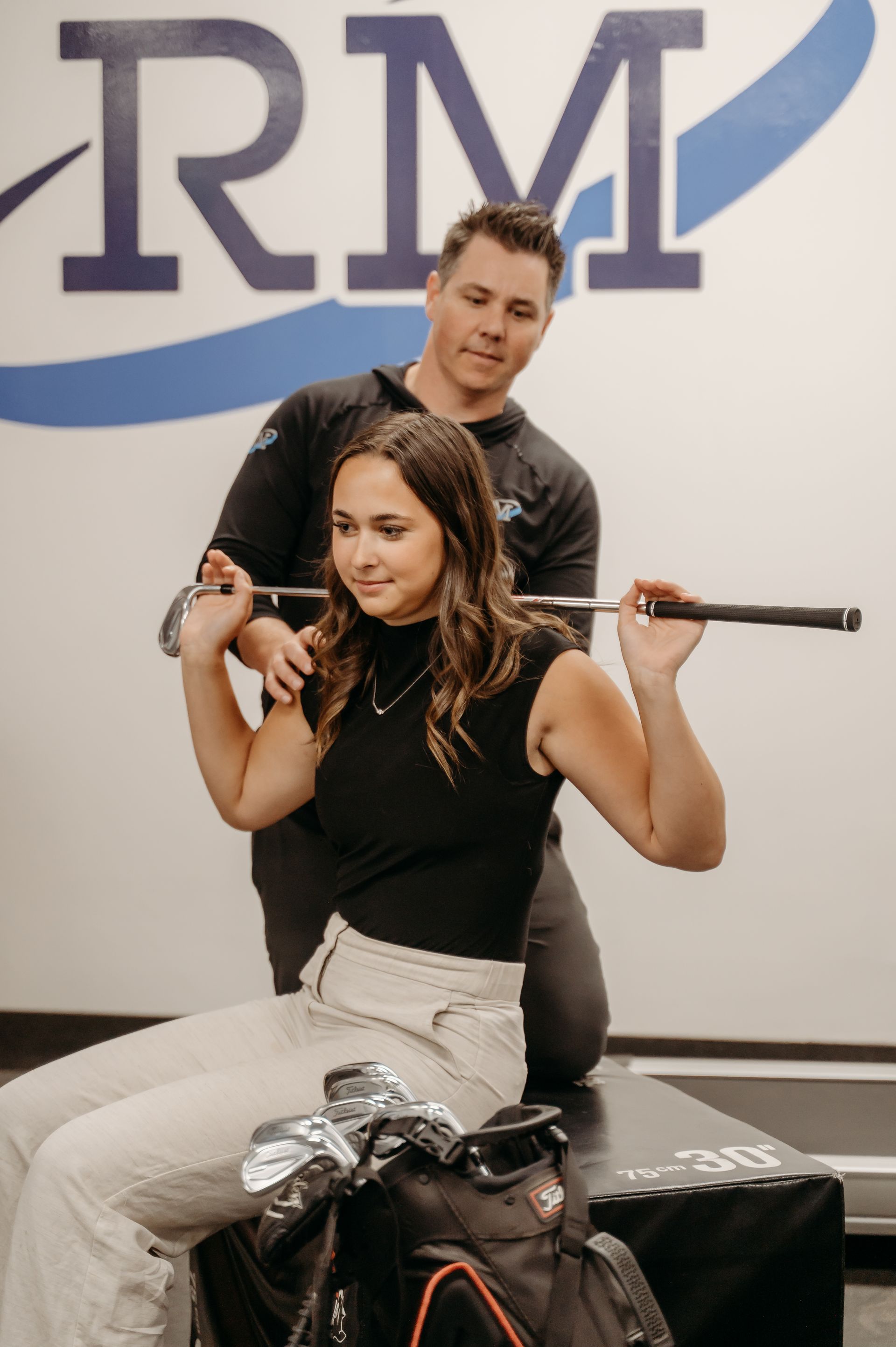 Physiotherapist performing Golf Assessment